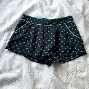 Dark blue with green shorts